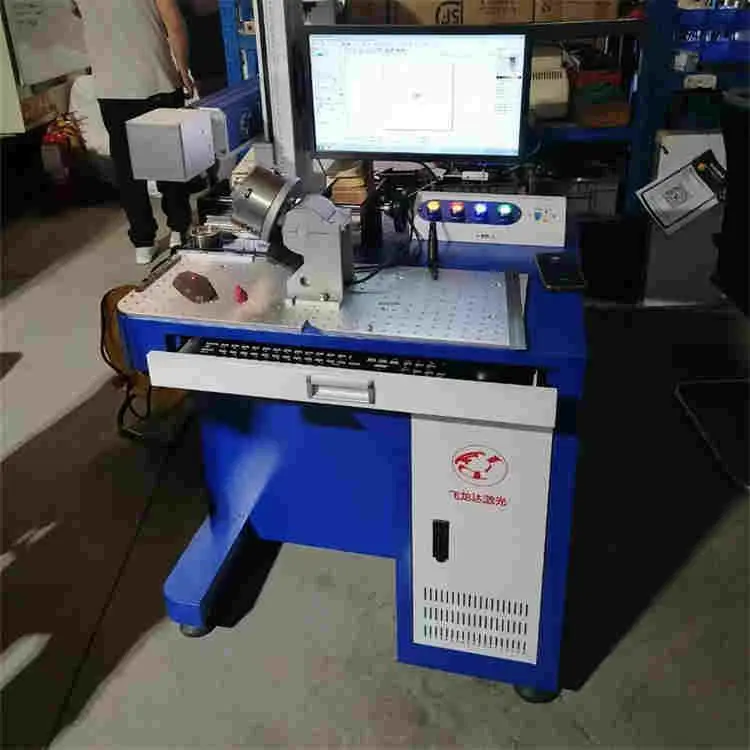 飞龙达打标机维修电话非金属雕刻机光纤激光打标机免费调试